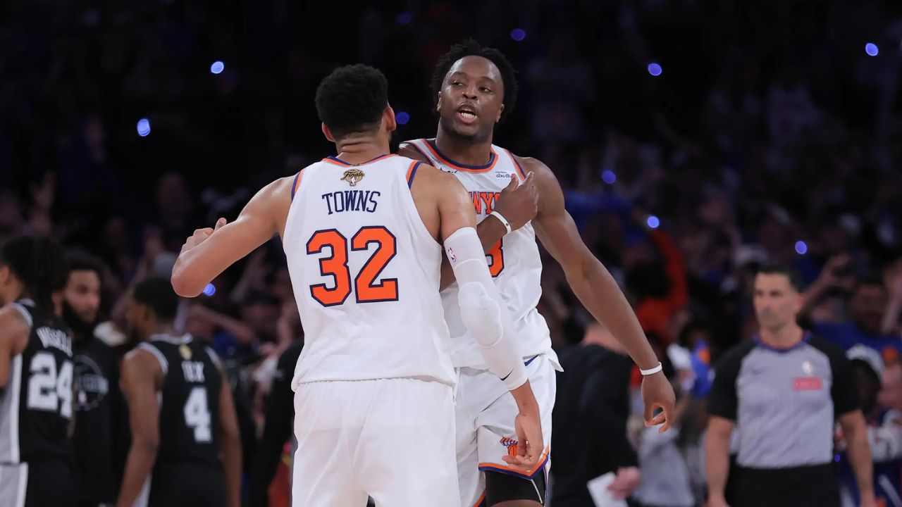 Jun 10, 2026; New York, New York, USA; New York Knicks forward Og Anunoby (8) and center Karl-Anthony Towns (32) react in the fourth quarter against the San Antonio Spurs during game four of the 2026 NBA Finals at Madison Square Garden. Mandatory Credit: Brad Penner-Imagn Images