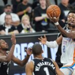 May 28, 2026; San Antonio, Texas, USA; Oklahoma City Thunder guard Shai Gilgeous-Alexander (2) shoots the ball against the San Antonio Spurs in the first half during game six of the western conference finals for the 2026 NBA playoffs at Frost Bank Center. Mandatory Credit: Dustin Safranek-Imagn Images