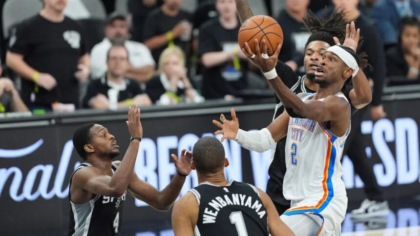 May 28, 2026; San Antonio, Texas, USA; Oklahoma City Thunder guard Shai Gilgeous-Alexander (2) shoots the ball against the San Antonio Spurs in the first half during game six of the western conference finals for the 2026 NBA playoffs at Frost Bank Center. Mandatory Credit: Dustin Safranek-Imagn Images