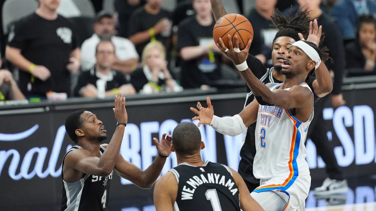 May 28, 2026; San Antonio, Texas, USA; Oklahoma City Thunder guard Shai Gilgeous-Alexander (2) shoots the ball against the San Antonio Spurs in the first half during game six of the western conference finals for the 2026 NBA playoffs at Frost Bank Center. Mandatory Credit: Dustin Safranek-Imagn Images