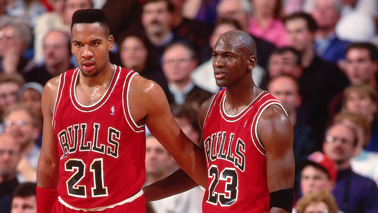 PORTLAND, OR - 1991: Stacey King #21 and Michael Jordan #23 of the Chicago Bulls talk during the game against the Portland Trailblazers played at the Veterans Memorial Coliseum in Portland, Oregon circa 1991. (Photo by Brian Drake/NBAE via Getty Images)