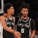 NEW YORK, NY - JUNE 5: Dylan Harper #2 and Stephon Castle #5 of the San Antonio Spurs look on during the game against the New York Knicks during Game Three of the 2026 NBA Finals on June 8, 2026 at Madison Square Garden in New York, New York. (Photo by Jesse D. Garrabrant/NBAE via Getty Images)
