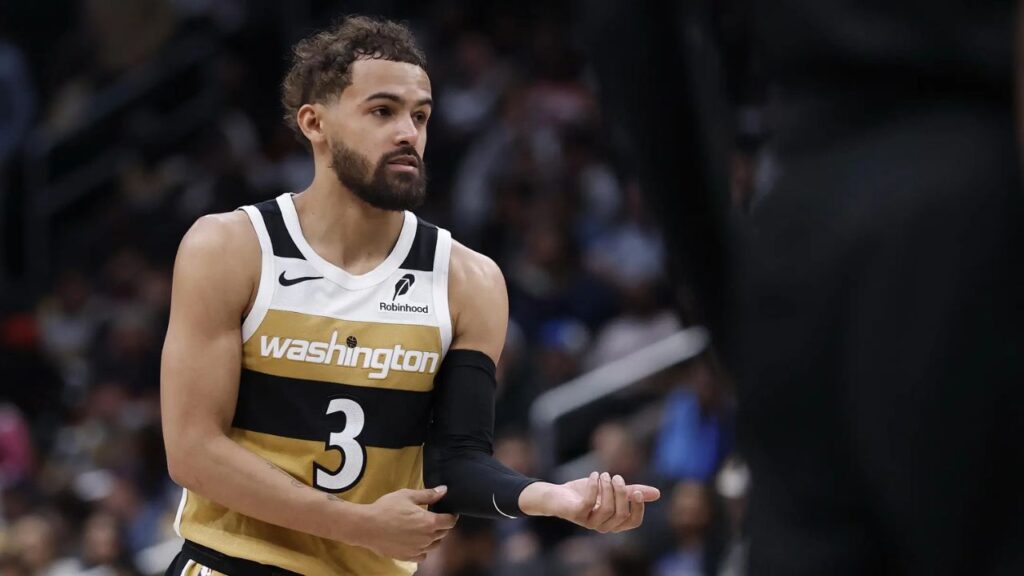 Mar 5, 2026; Washington, District of Columbia, USA; Washington Wizards guard Trae Young (3) stands on the court against the Utah Jazz in the second half at Capital One Arena. Mandatory Credit: Geoff Burke-Imagn Images