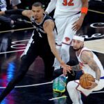 Victor Wembanyama turns the ball over to Jose Alvarado during the second quarter of the Knicks’ Game 1 win over the Spurs. (Image by Charles Wenzelberg / New York Post)