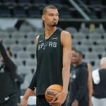 Jun 2, 2026; San Antonio, TX, USA; San Antonio Spurs forward Victor Wembanyama (1) looks over during practice on media day for the 2026 NBA Finals at Frost Bank Center. Mandatory Credit: Daniel Dunn-Imagn Images