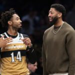 Apr 5, 2026; Brooklyn, New York, USA; Washington Wizards forward Anthony Davis (23) talks with forward Leaky Black (14) during the first half against the Brooklyn Nets at Barclays Center. Mandatory Credit: Vincent Carchietta-Imagn Images