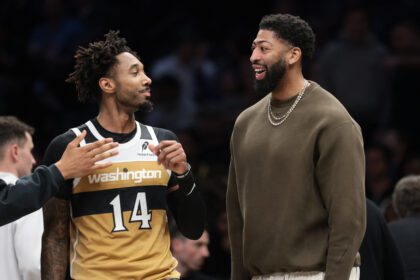 Apr 5, 2026; Brooklyn, New York, USA; Washington Wizards forward Anthony Davis (23) talks with forward Leaky Black (14) during the first half against the Brooklyn Nets at Barclays Center. Mandatory Credit: Vincent Carchietta-Imagn Images
