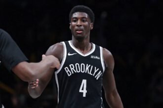 Brooklyn Nets guard Drake Powell (4) celebrates with forward E.J. Liddell (9) after defeafting the Washington Wizards at Barclays Center.