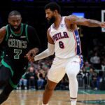 BOSTON, MASSACHUSETTS - APRIL 28: Paul George #8 of the Philadelphia 76ers defends Jaylen Brown #7 of the Boston Celtics during the second half of Game Five of the First Round of the NBA Eastern Conference Playoff at TD Garden on April 28, 2026 in Boston, Massachusetts. (Photo by Maddie Meyer/Getty Images)