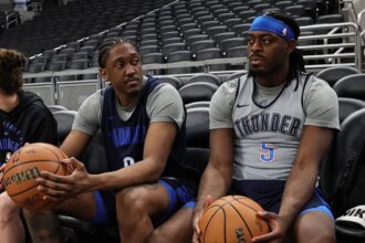 INDIANAPOLIS, IN - JUNE 10: Jalen Williams #8 and Luguentz Dort #5 of the Oklahoma City Thunder look on during 2025 NBA Finals Practice and Media Availability on June 10, 2025 at Gainbridge Fieldhouse in Indianapolis, Indiana. (Photo by Jim Poorten/NBAE via Getty Images)