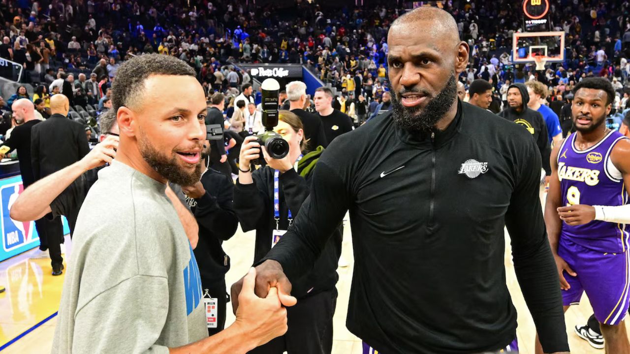SAN FRANCISCO, CA - APRIL 9: LeBron James #23 of the Los Angeles Lakers and Stephen Curry #30 of the Golden State Warriors high five after the game on April 9, 2026 at Chase Center in San Francisco, California. (Photo by Adam Pantozzi/NBAE via Getty Images)