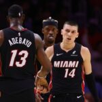 Nov 4, 2024; Miami, Florida, USA; Miami Heat guard Tyler Herro (14) celebrates with Miami Heat center Bam Adebayo (13) after scoring against the Sacramento Kings during the fourth quarter at Kaseya Center. Mandatory Credit: Sam Navarro-Imagn Images
