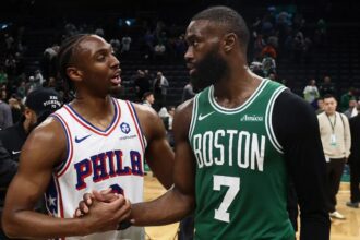 May 2, 2026; Boston, Massachusetts, USA; Philadelphia 76ers guard Tyrese Maxey (0) talks with Boston Celtics guard Jaylen Brown (7)after Philadephia’s win in game seven of the first round of the 2026 NBA Playoffs at TD Garden. Mandatory Credit: Winslow Townson-Imagn Images