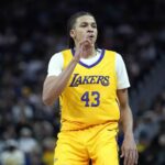Lakers rookie Cameron Carr celebrates after making a three-pointer against Golden State in an NBA summer league game on Friday night. Credit: Thearon W. Henderson / Getty Images