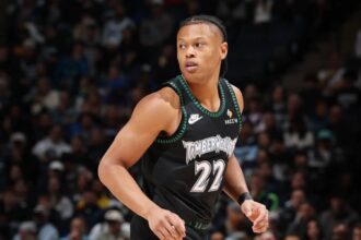 aylen Clark #22 of the Minnesota Timberwolves looks on during the game against the San Antonio Spurs on November 30, 2025 at Target Center in Minneapolis, Minnesota.