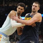 Jan 4, 2025; San Antonio, Texas, USA; San Antonio Spurs center Victor Wembanyama (1) and Denver Nuggets center Nikola Jokic (15) battle for position during an inbound pass in the second half at Frost Bank Center. Mandatory Credit: Scott Wachter-Imagn Images