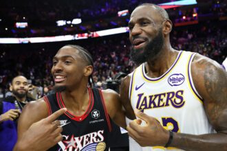 Dec 7, 2025; Philadelphia, Pennsylvania, USA; Los Angeles Lakers forward Lebron James (23) and Philadelphia 76ers guard Tyrese Maxey after the game at Xfinity Mobile Arena. Mandatory Credit: Bill Streicher-Imagn Images