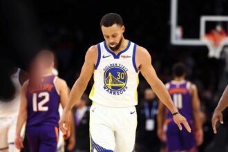 Dec 18, 2025; Phoenix, Arizona, USA; Golden State Warriors guard Stephen Curry (30) reacts against the Phoenix Suns at Mortgage Matchup Center. Mandatory Credit: Mark J. Rebilas-Imagn Images