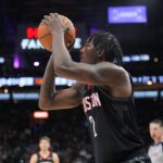Houston Rockets forward Dorian Finney-Smith (2) shoots the ball in the first half against the San Antonio Spurs at Frost Bank Center.