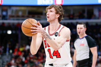 Mar 23, 2026; Chicago, Illinois, USA; Chicago Bulls forward Matas Buzelis (14) shoots against the Houston Rockets during the second half at United Center. Mandatory Credit: Kamil Krzaczynski-Imagn Images