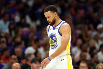 Apr 17, 2026; Phoenix, Arizona, USA; Golden State Warriors guard Stephen Curry (30) against the Phoenix Suns during the play-in rounds of the 2026 NBA Playoffs at Mortgage Matchup Center. Mandatory Credit: Mark J. Rebilas-Imagn Images