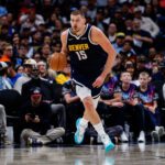 Apr 27, 2026; Denver, Colorado, USA; Denver Nuggets center Nikola Jokic (15) dribbles the ball up court in the third quarter against the Minnesota Timberwolves during game five of the first round of the 2026 NBA Playoffs at Ball Arena. Mandatory Credit: Isaiah J. Downing-Imagn Images