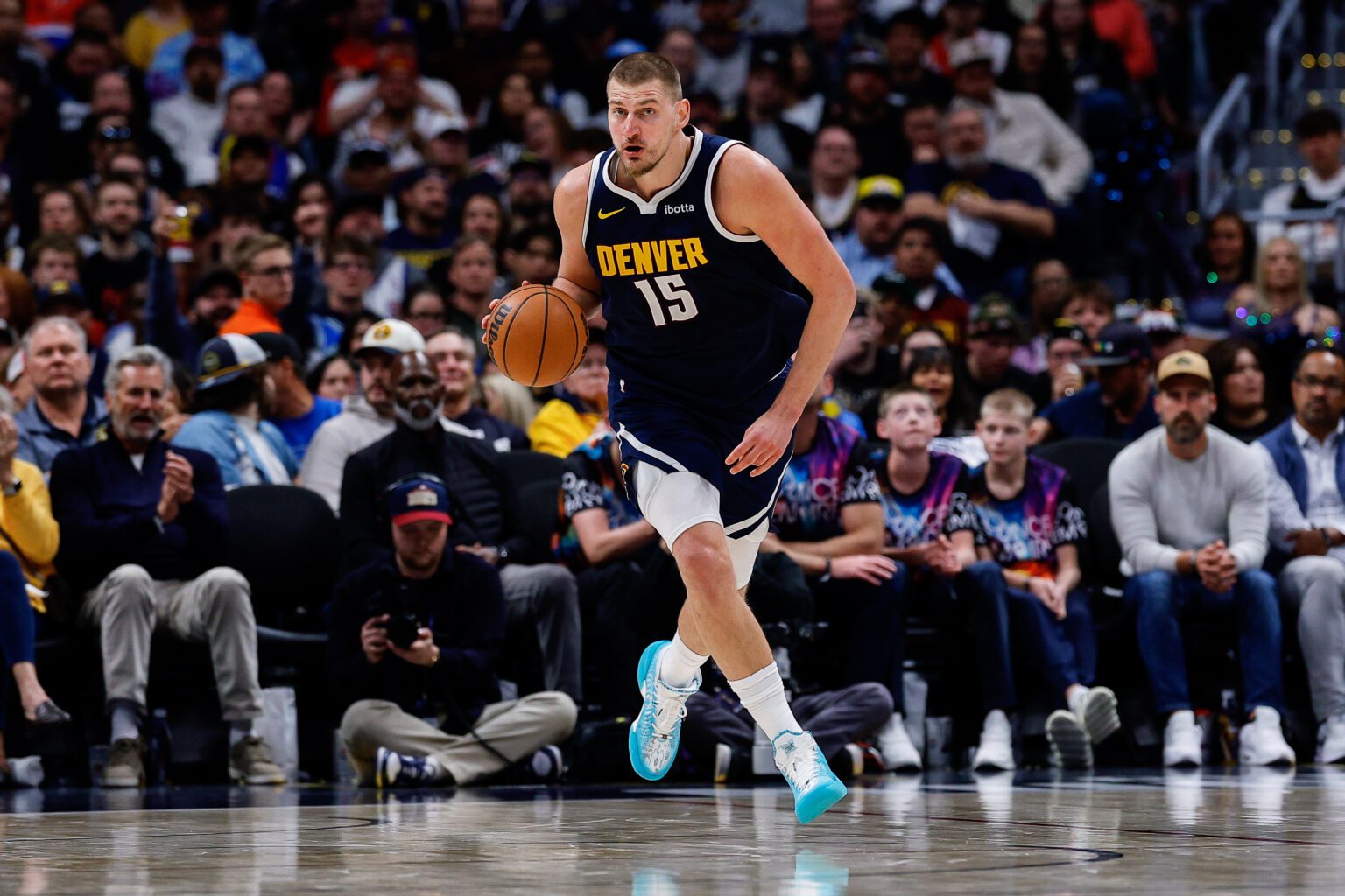 Apr 27, 2026; Denver, Colorado, USA; Denver Nuggets center Nikola Jokic (15) dribbles the ball up court in the third quarter against the Minnesota Timberwolves during game five of the first round of the 2026 NBA Playoffs at Ball Arena. Mandatory Credit: Isaiah J. Downing-Imagn Images