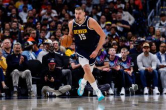 Apr 27, 2026; Denver, Colorado, USA; Denver Nuggets center Nikola Jokic (15) dribbles the ball up court in the third quarter against the Minnesota Timberwolves during game five of the first round of the 2026 NBA Playoffs at Ball Arena. Mandatory Credit: Isaiah J. Downing-Imagn Images