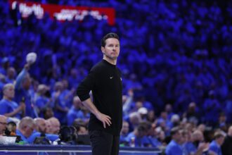 May 5, 2026; Oklahoma City, Oklahoma, USA; Los Angeles Lakers head coach JJ Redick watches his team play against the Oklahoma City Thunder in the second half during game one of the second round of the 2026 NBA Playoffs at Paycom Center. Mandatory Credit: Alonzo Adams-Imagn Images