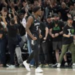 May 8, 2026; Minneapolis, Minnesota, USA; Minnesota Timberwolves guard Anthony Edwards (5) celebrates after making a three point shot as time expires in the first quarter against the San Antonio Spurs during game three of the second round of the 2026 NBA Playoffs at Target Center. Mandatory Credit: Jesse Johnson-Imagn Images