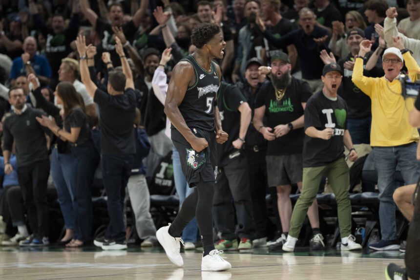 May 8, 2026; Minneapolis, Minnesota, USA; Minnesota Timberwolves guard Anthony Edwards (5) celebrates after making a three point shot as time expires in the first quarter against the San Antonio Spurs during game three of the second round of the 2026 NBA Playoffs at Target Center. Mandatory Credit: Jesse Johnson-Imagn Images