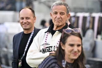 May 9, 2026; Los Angeles, California, USA; Former Disney CEO Bob Iger watches pregame warm ups before the game between Angel City FC and the San Diego Wave at BMO Stadium. Mandatory Credit: Kelvin Kuo-Imagn Images