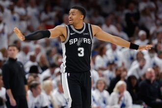 May 26, 2026; Oklahoma City, Oklahoma, USA; San Antonio Spurs forward Keldon Johnson (3) reacts after a play during the third quarter against the Oklahoma City Thunder in game five of the western conference finals for the 2026 NBA playoffs at Paycom Center. Mandatory Credit: Alonzo Adams-Imagn Images