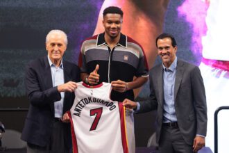 Jul 16, 2026; Miami, FL, USA; Miami Heat forward Giannis Antetokounmpo (7) is introduced as a new member of the team by Miami Heat president Pat Riley (left) and head coach Erik Spoelstra (right) during a press conference at Kaseya Center. Mandatory Credit: Sam Navarro-Imagn Images