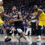 May 7, 2026; Oklahoma City, Oklahoma, USA; Oklahoma City Thunder guard Ajay Mitchell (25) drives between Los Angeles Lakers center Jaxson Hayes (11) and forward LeBron James (23) in the second half during game two of the second round of the 2026 NBA Playoffs at Paycom Center. Mandatory Credit: Alonzo Adams-Imagn Images