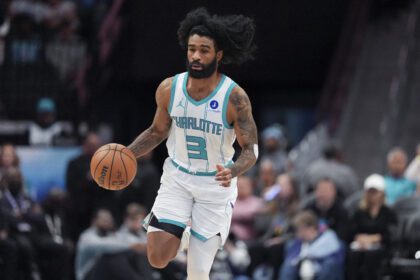 Mar 24, 2026; Charlotte, North Carolina, USA; Charlotte Hornets guard Coby White (3) brings the ball up court against the Sacramento Kings during the second half at Spectrum Center. Mandatory Credit: Jim Dedmon-Imagn Images