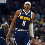 Mar 27, 2026; Denver, Colorado, USA; Denver Nuggets guard Peyton Watson (8) after making a basket during the second half against the Utah Jazz at Ball Arena. Mandatory Credit: Christopher Hanewinckel-Imagn Images