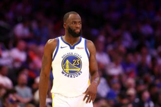 Apr 17, 2026; Phoenix, Arizona, USA; Golden State Warriors forward Draymond Green (23) against the Phoenix Suns during the play-in rounds of the 2026 NBA Playoffs at Mortgage Matchup Center. Mandatory Credit: Mark J. Rebilas-Imagn Images