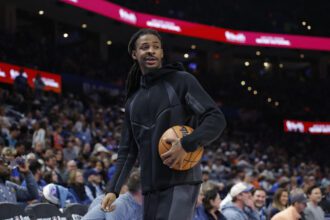Dec 22, 2025; Oklahoma City, Oklahoma, USA; Memphis Grizzlies guard Ja Morant (12) walks off the court during a time out against the Oklahoma City Thunder during the second half at Paycom Center. Mandatory Credit: Alonzo Adams-Imagn Images