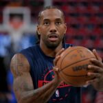 Apr 15, 2026; Inglewood, California, USA; Los Angeles Clippers forward Kawhi Leonard (2) warms up prior to the game against the Golden State Warriors in the play-in rounds of the 2026 NBA Playoffs at Intuit Dome. Mandatory Credit: Jayne Kamin-Oncea-Imagn Images