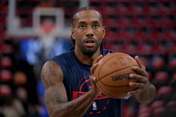 Apr 15, 2026; Inglewood, California, USA; Los Angeles Clippers forward Kawhi Leonard (2) warms up prior to the game against the Golden State Warriors in the play-in rounds of the 2026 NBA Playoffs at Intuit Dome. Mandatory Credit: Jayne Kamin-Oncea-Imagn Images