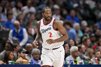 Mar 21, 2026; Dallas, Texas, USA; LA Clippers forward Kawhi Leonard (2) runs back up court during the second half against the Dallas Mavericks at the American Airlines Center. Mandatory Credit: Jerome Miron-Imagn Images