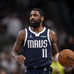 Feb 12, 2025; Dallas, Texas, USA; Dallas Mavericks guard Kyrie Irving (11) in action during the game between the Dallas Mavericks and the Golden State Warriors at the American Airlines Center. Mandatory Credit: Jerome Miron-Imagn Images