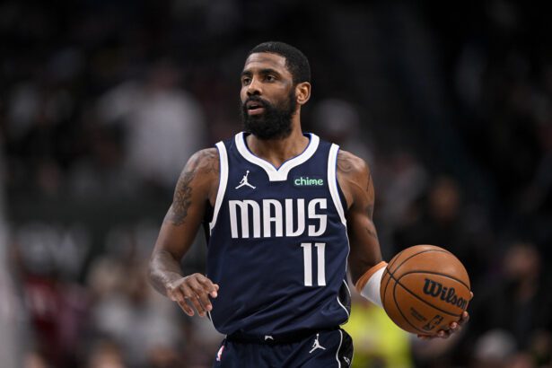 Feb 12, 2025; Dallas, Texas, USA; Dallas Mavericks guard Kyrie Irving (11) in action during the game between the Dallas Mavericks and the Golden State Warriors at the American Airlines Center. Mandatory Credit: Jerome Miron-Imagn Images