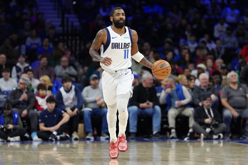 Feb 4, 2025; Philadelphia, Pennsylvania, USA; Dallas Mavericks guard Kyrie Irving (11) controls the ball against the Philadelphia 76ers in the first quarter at Wells Fargo Center. Mandatory Credit: Kyle Ross-Imagn Images