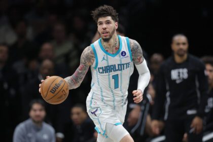 Mar 31, 2026; Brooklyn, New York, USA; Charlotte Hornets guard LaMelo Ball (1) brings the ball up court against the Brooklyn Nets during the third quarter at Barclays Center. Mandatory Credit: Brad Penner-Imagn Images