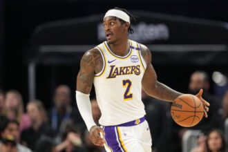 Jan 25, 2025; San Francisco, California, USA; Los Angeles Lakers forward Jarred Vanderbilt (2) dribbles against the Golden State Warriors during the fourth quarter at Chase Center. Mandatory Credit: Darren Yamashita-Imagn Images