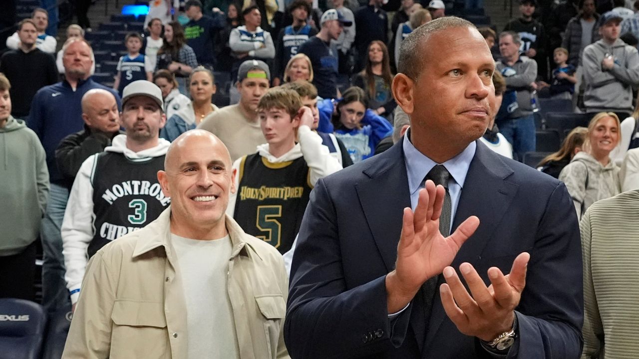 Mar 28, 2025; Minneapolis, Minnesota, USA; Minnesota Timberwolves minority owners Marc Lore and Alex Rodriguez celebrate the team's win over the Phoenix Suns at Target Center. Mandatory Credit: Bruce Kluckhohn-Imagn Images