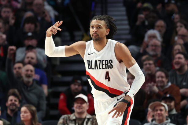 Mar 10, 2026; Portland, Oregon, USA; Portland Trail Blazers guard/forward Matisse Thybulle (4) reacts after making a three-point shot against the Charlotte Hornets during the first half at Moda Center. Mandatory Credit: Jaime Valdez-Imagn Images