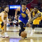 Jun 11, 2015; Cleveland, OH, USA; Golden State Warriors guard Stephen Curry (30) drives to the basket against Cleveland Cavaliers guard Matthew Dellavedova (8) and center Tristan Thompson (13) during the first quarter in game four of the NBA Finals at Quicken Loans Arena. Mandatory Credit: Bob Donnan-USA TODAY Sports